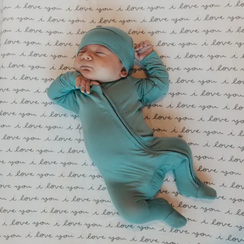 Wild Little Things Bamboo Zipper Footie W/matching bow. – Sea Breeze